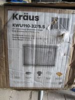 Box label showing model, dimensions and specs