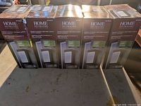 Front of five sealed lantern boxes