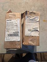Two boxed Ecolab Nexa Compact Manual Hand Soap Dispensers
