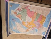 Upside-down view of laminated political map of Canada and North America
