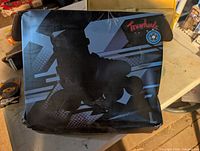 Retail box showing Truwheelz branding and skate graphic