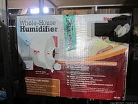 Honeywell whole-house humidifier box front showing model and features