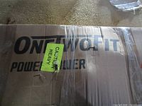 Box top showing OneTwoFit branding and Power Tower label