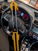 Lock installed on steering wheel showing fit and color