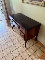 Desk angled view left side in room