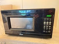 Front view showing Master Chef logo, digital keypad, clock display