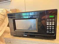 Front view showing digital keypad, LED display and Master Chef branding