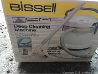 Box of Bissell Deep Cleaning Machine showing product name, model number 1655, and image of the product.