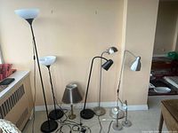 Group shot showing all seven lamps standing together