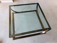 Full view of square glass coffee table