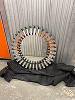front view showing entire round mirror and frame