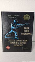 Front cover showing title, brigade, unit insignia and soldier graphic