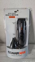 Front view of sealed Conair Man trimmer package