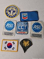 All seven patches laid out showing fronts