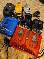 Group shot of all chargers and batteries