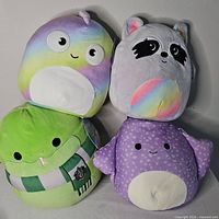 Group shot showing all four Squishmallows plush toys