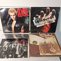 Four LPs: Billy Idol, Judas Priest British Steel, Queen Greatest Hits, Led Zeppelin II