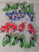 All twelve sealed Marvel keychains grouped