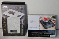 Both boxed digital scales side by side