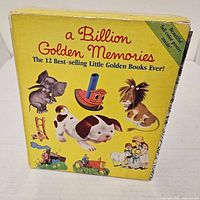 Front of yellow slipcase showing title and animal illustrations