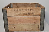 Front view showing "Rancho Grande 3 - Las Vegas 55" stencil and metal corners