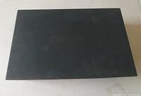 Closed black outer slip box