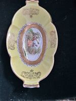 Full view of tray front showing design and handles