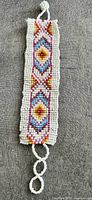 Full bracelet front showing overall pattern and closure loops