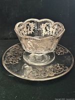 Compote on underplate showing overall design, etching and gilded rims