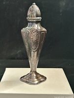 Full view of silver-plated Art Nouveau salt shaker