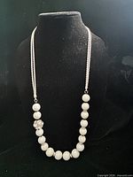 Full view of necklace on bust form