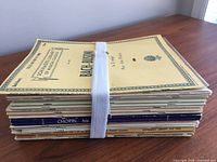 Stacked bundle showing Bach-Busoni cover and thickness of collection