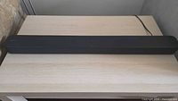 Full view of Sony HT-S100F soundbar on tabletop