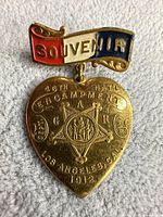 Front view showing enamel bar and engraved heart drop