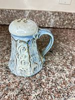 Front view of handmade ceramic salt shaker