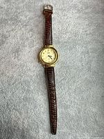 Full view of watch front showing dial, case, and band