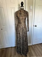 Front view of leopard print maxi dress on mannequin
