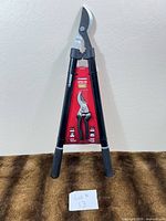 Full view of Husky lopper and pruner set in packaging