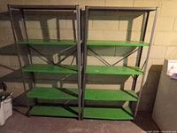 Two metal shelving units side by side