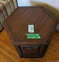 Top view showing hexagonal shape, dark brown veneer surface and size note