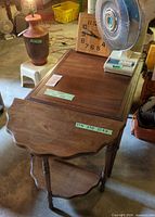 Top and side view of both tables showing finish and dimensions tape