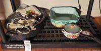 Full lot view showing roaster, ceramic dish, saucepan, thermometer, mixer cord