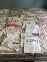 Full lot of pillowcases showing variety of embroidery and trims