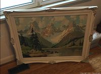 Frontal view of framed landscape painting showing full subject and frame