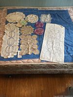 Full lot on blue towel showing all linens