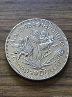 Reverse showing prairie crocus and inscriptions