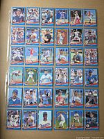 Full nine-pocket page showing entire group of cards