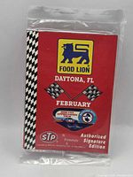 Front of sealed promotional pack with logos and February Daytona FL text