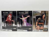Front view of three 2022 Upper Deck AEW Allure Star Futures cards: Abadon, Yuka Sakazaki, Kris Statlander