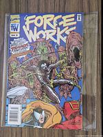Front cover of Force Works #9 in plastic sleeve